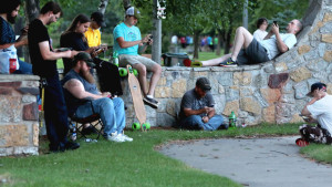 Gamers gather at Gregory Park to play the popular new game Pokemon Go Friday in Brainerd. Pokemon Go is an augmented reality cell phone game which uses real life locations like the park as the basis of the game. (Kelly Humphrey, Brainerd Dispatch)