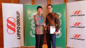 Anthony Tan, Group CEO and Co-Founder, Grab and John Riady, Director, Lippo Group shake hands after signing the strategic partnership agreement between Grab and Lippo Group on 21 March 2016. Image -dealstreetasia.com