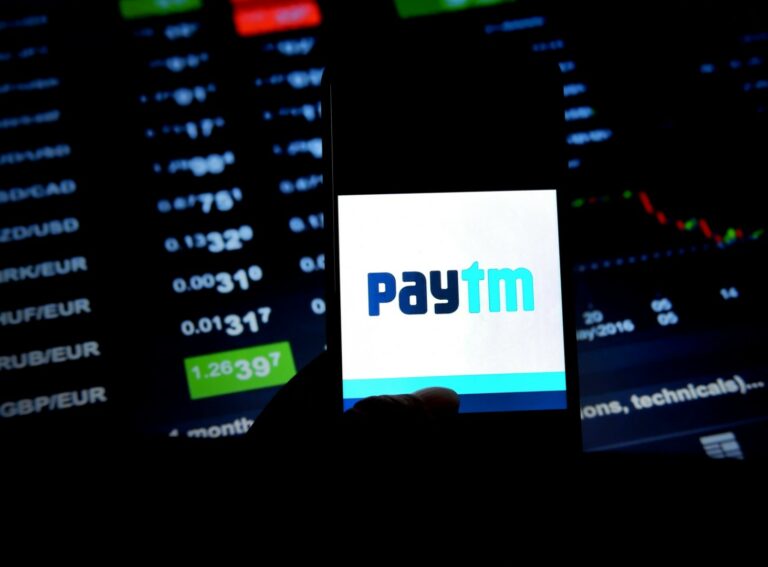 In this photo illustration a popular e commerce application Paytm logo seen being displayed in a smartphone