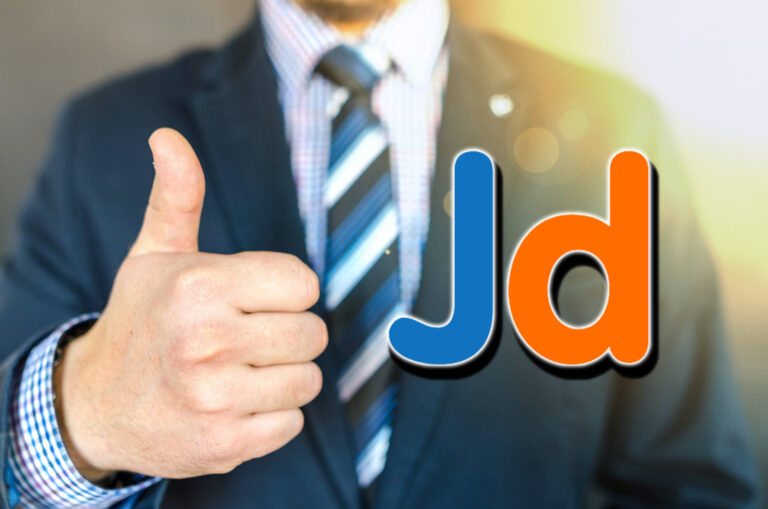 Close-up Photo of Man Wearing Black Suit Jacket Doing Thumbs Up Gesture