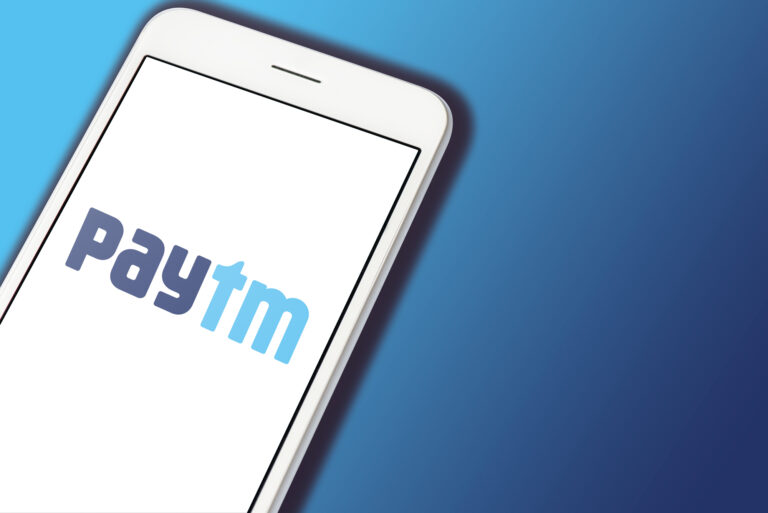 Paytm logo displayed on a White smartphone