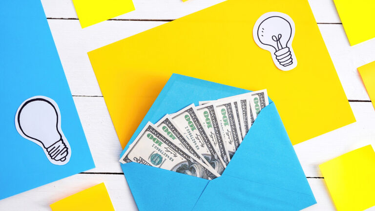 Blue envelope with money with yellow and blue papers, icons of lamp