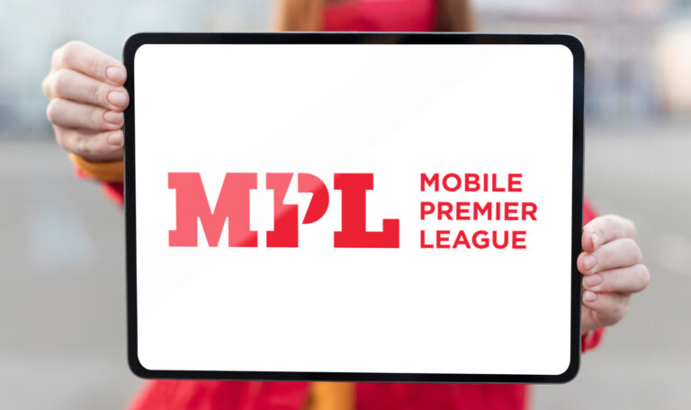 MPL logo displayed on a tablet held by Redhead woman