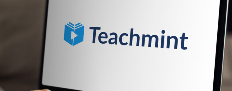 Teachmint logo displayed on laptop screen