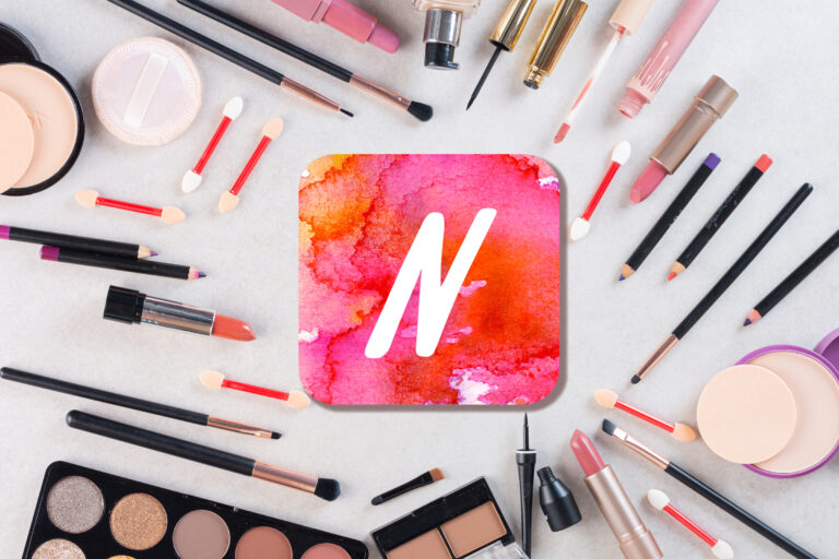 Nykaa logo mockup with beauty products