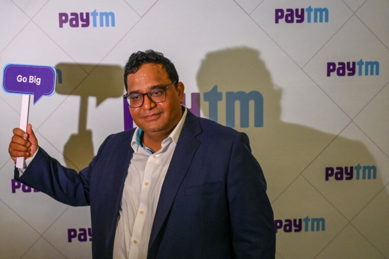 Paytm, an Indian digital payment platform, founder Vijay Shekhar Sharma poses during his company's IPO listing ceremony at the Bombay Stock Exchange (BSE) in Mumbai on November 18, 2021