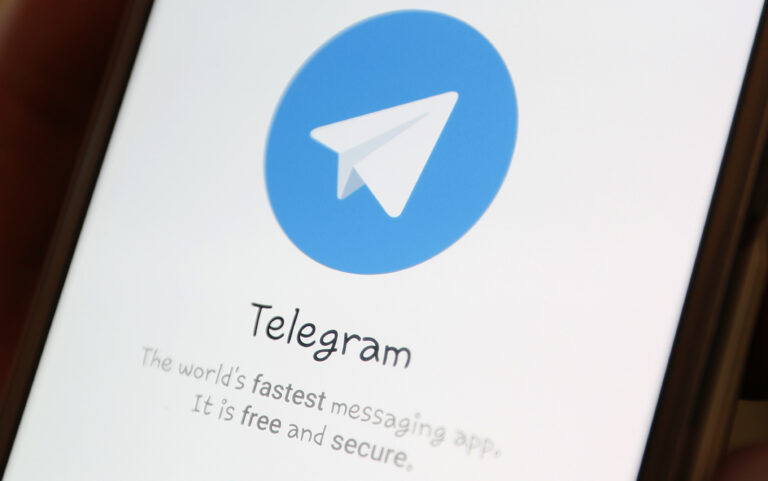 Telegram logo is seen on a screen of a smartphone in this picture illustration