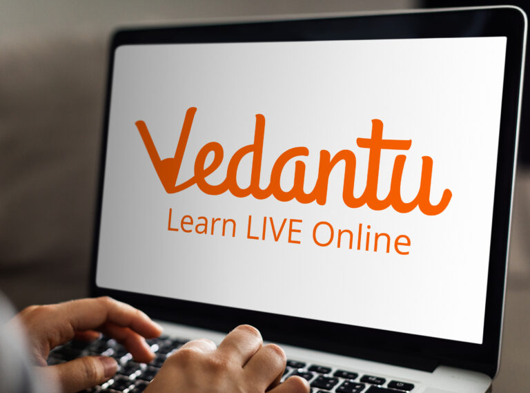 Vedantu logo displayed on laptop screen