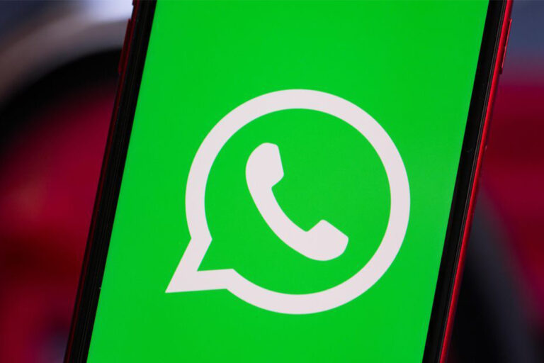 WhatsApp logo displayed on a smartphone
