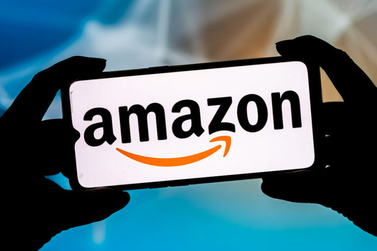 In this photo illustration an Amazon logo seen displayed on a smartphone