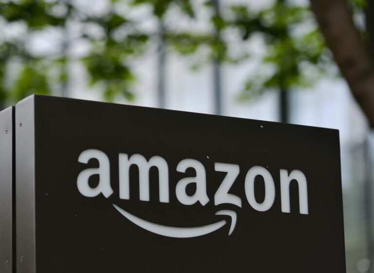 Amazon logo seen at the entrance to Amazon's Building