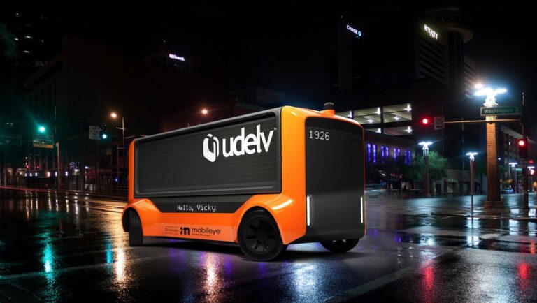 Udelv Transporter autonomous delivery vehicle delivers goods at a precise time & location