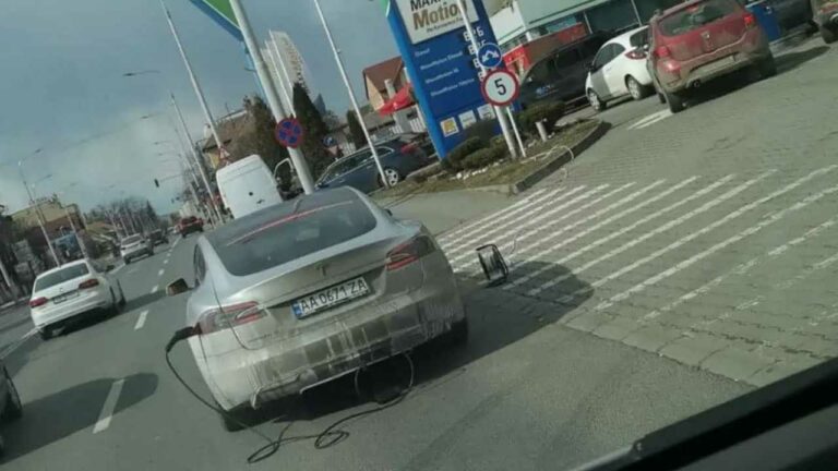Ukrainian Tesla Driver Stranded In Romania Charges At Gas Station