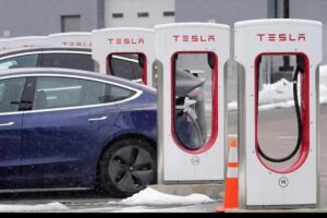 A Tesla car parked in one of its showrooms 