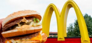 McDonald's logo along with the figure of a burger at an outlet