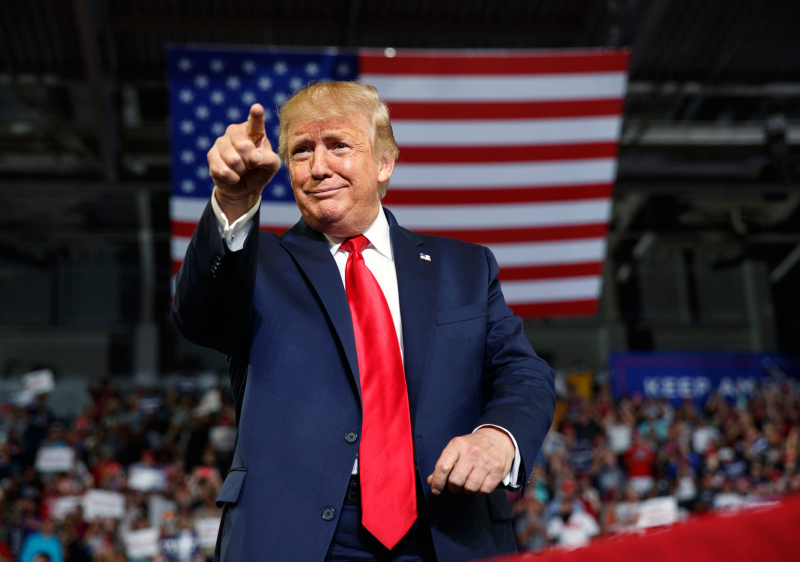Image of Donald Trump with the American flag in the background