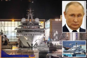 Luxury yacht Scheherazade stationed, with an image of Putin