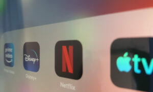 A screen showing the four streaming services of the entertainment sector