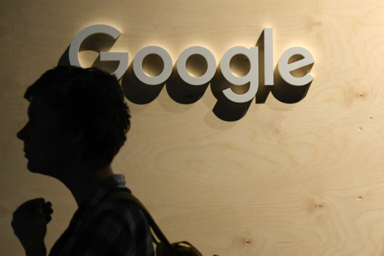 Google logo shown with a figure in front