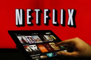 Old logo of Netflix depicted in front of a screen