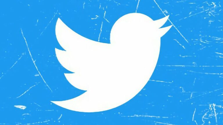 Twitter logo depicted against a blue backdrop