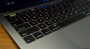 Image depicting a MacBook focused on keyboard