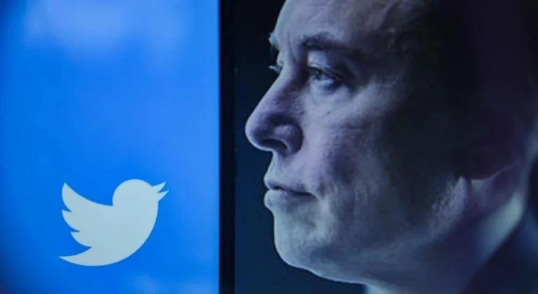 Twitter logo alongside Elon Musk