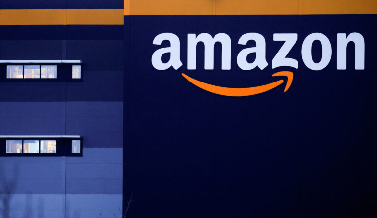 The logo of Amazon is seen at the company's logistics center in Bretigny-sur-Orge, near Paris, France