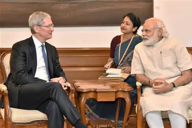 Apple CEO Tim Cook with Prime Minister Narendra Modi in New Delhi.  May 2016. Photo: PTI