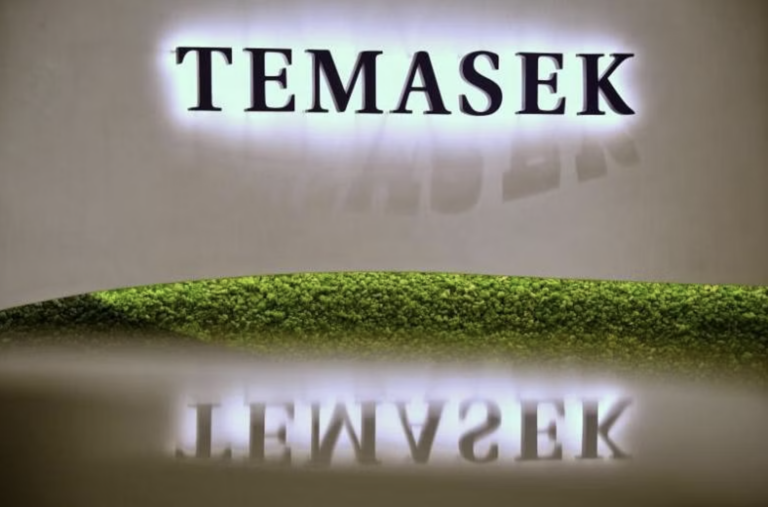 Temasek cuts compensation