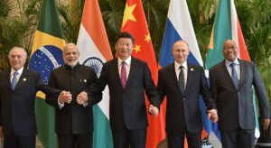 BRICS currency will leverage gold to beat the dollar