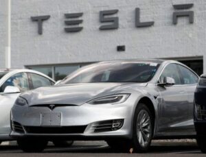 FILE - This July 8, 2018, file photo shows Tesla 2018 Model 3 sedans sitting on display outside a Tesla showroom in Littleton, Colo. The U.S. government has opened a formal investigation into Tesla's Autopilot partially automated driving system, saying it has trouble spotting parked emergency vehicles. The National Highway Traffic Safety Administration announced the action Monday, Aug. 16, 2021, in a posting on its website. (AP Photo/David Zalubowsi, File)AP