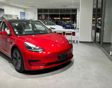 A red Tesla Q3