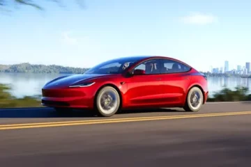 A red Tesla Model 3