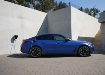 a photo of a BMW EV being charged through ChargeForward