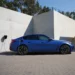 a photo of a BMW EV being charged through ChargeForward