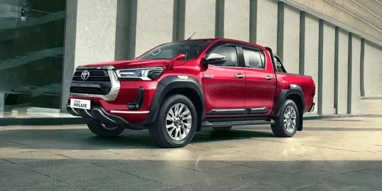 A red Toyota Hilux
