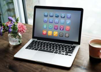Laptop on a wooden table