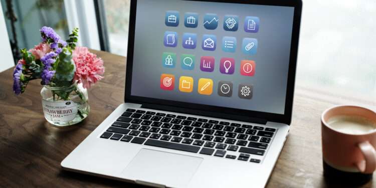 Laptop on a wooden table