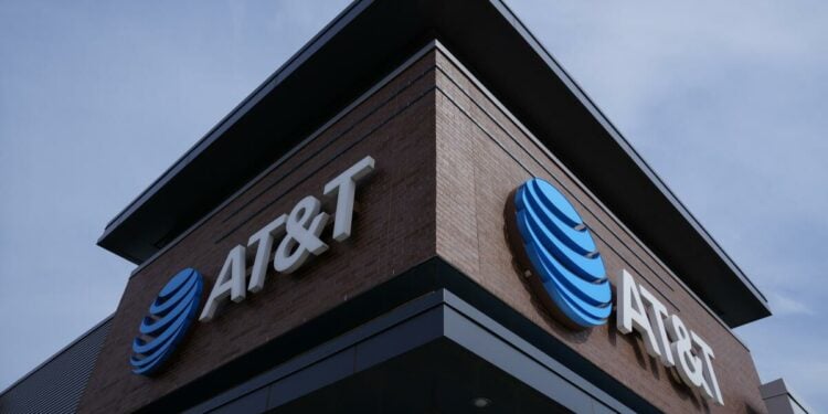 AT&T will give $5 to customers hit by cellphone network outage.