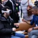 People using Apple Vision Pro Headsets attract reactions from others