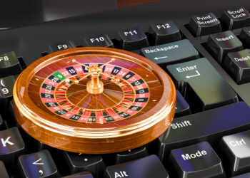 Casino roulette on keyboard button, casino online concept. 3D rendering