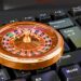 Casino roulette on keyboard button, casino online concept. 3D rendering