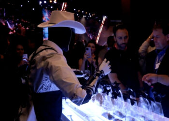 Tesla Unveils Optimus Robots at Cybercab Event, But Their Autonomy Remains Questionable