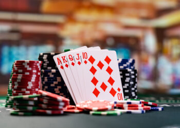 Poker royal flush with casino chips