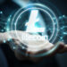 Businessman on blurred background using litecoins cryptocurrency 3D rendering