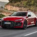 Audi Sport has pulled the wraps off the new RS5, and this one rewrites the rulebook. It replaces both the old RS4 and RS5, arrives as a sedan and Avant, and for the first time wears a plug-in hybrid badge. This is not mild electrification. It’s a full-blown performance hybrid with numbers big enough to rattle the segment. Under the hood sits a 2.9-liter twin-turbo V6, evolved from the previous RS4/RS5 unit. On its own, it delivers 503 hp and 600 Nm of torque. An electric motor integrated into the eight-speed automatic transmission adds another 174 hp and 460 Nm. Combined output stands at a formidable 630 hp and 825 Nm. That puts it well ahead of the base BMW M3 and even the BMW M3 Competition xDrive. Audi claims 0–100 km/h in 3.6 seconds. There’s also a boost function that unleashes maximum output for 10 seconds at a time. Practical family car, meet launch-control party trick. Real Electric Range, Not Just a Token The RS5 packs a 22 kWh net battery mounted under the boot floor. It supports AC charging up to 11 kW and promises up to 80 km of electric-only range. That’s a meaningful number in daily use, and far beyond what performance hybrids like the Mercedes-AMG C63 S E Performance offered in earlier iterations. In theory, you could commute silently during the week and still have 630 hp waiting for you on Sunday morning. That dual personality is clearly the brief here. Quattro, Evolved Audi hasn’t ignored handling. The Quattro all-wheel-drive system gets a new center differential designed to sharpen turn-in and reduce traditional Audi understeer. At the rear, Dynamic Torque Control uses an electromechanical torque-vectoring transaxle to distribute power between the rear wheels in milliseconds. There’s even an RS Torque Rear mode. Translation: drift mode. For a brand once stereotyped for nose-heavy handling, this is a deliberate statement. Braking hardware is equally serious. Standard steel discs measure 420 mm at the front and 400 mm at the rear. Optional carbon ceramics increase that to 440 mm and 410 mm, respectively, trimming around 30 kg in the process. The Weight Question Here’s the part that will divide opinion. The new RS5 sedan weighs 2,355 kg with the driver. The Avant adds 15 kg more. That’s roughly 550 kg heavier than the old RS4 Avant and significantly more than rivals like the BMW M5, though it undercuts that car slightly in absolute terms. In fact, the RS5 now outweighs certain versions of the Ford F-150 SuperCab. For enthusiasts who equate performance with lightness, that’s a hard pill to swallow. Still, electrification comes at a cost. Bigger batteries, added hardware, and reinforced structures all add mass. The question is whether the chassis tuning and torque vectoring can mask it on the road. Aggressive Design, Unified Identity Visually, the RS5 leans into its role as Audi’s compact performance flagship. It’s around 90 mm wider than the standard A5, wears a darker honeycomb grille, and features distinctive lighting signatures with checkered-flag detailing. At the rear, a sculpted diffuser and large matte oval exhaust tips complete the look. It certainly looks every bit the modern RS car. Now the spotlight turns to how it drives. If Audi has managed to blend electrified muscle with genuine agility, the RS5 could signal a new chapter for performance sedans and wagons. If not, critics will point to the scales and ask uncomfortable questions. Either way, the era of lightweight turbo-only RS cars is officially over.