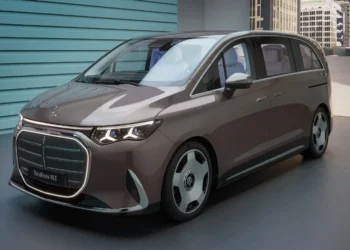 Luxury transportation is evolving, and it’s not happening inside traditional sedans anymore. Across parts of Asia and the Middle East, the most premium chauffeur vehicles aren’t cars like the S-Class or BMW 7 Series. They’re vans. Spacious, lounge-like vans that feel more like a first-class airline cabin than a car. Now, Mercedes-Benz wants to bring that experience to the United States with the Mercedes VLE, an all-electric luxury minivan designed to function as a rolling executive lounge. Luxury Vans Are the New Limousines In countries like Japan, China, and South Korea, luxury vans have quietly become the preferred choice for high-end chauffeur services. The logic is simple: more space, easier entry, and seating that focuses on passenger comfort rather than driver engagement. Brands like Toyota, Lexus, Hyundai, and Kia already sell high-spec vans where the second row feels like a private jet seat. These vehicles prioritize reclining seats, footrests, massage functions, and entertainment systems. Mercedes is now stepping into that world with the VLE, aiming to deliver the same experience but with German luxury and electric technology. A Bold Design Inspired by the Vision V Concept The VLE’s design takes cues from the Vision V concept shown last year. Up front, it features a large grille panel flanked by headlights with Mercedes’ signature three-pointed star graphics. A light bar runs across the front, tying the design together and giving the van a futuristic presence. While the shape remains unmistakably that of a minivan, the aerodynamic details stand out. The VLE achieves a drag coefficient of just 0.25, an impressive figure for such a large vehicle. At the rear, dramatic lighting dominates the design. Large vertical taillights and illuminated outlines along the roof create a striking visual signature at night. An Interior Built for Business-Class Comfort The real highlight of the VLE is inside. Mercedes offers three seating layouts depending on how buyers plan to use the vehicle. The entry configuration includes eight seats with two three-person benches. A more premium version provides six individual captain’s chairs. But the most luxurious option is the Grand Comfort Seat package. In that setup, second-row passengers get features usually reserved for flagship sedans. These include massage seats, calf supports, lumbar adjustments, fold-out tables, wireless charging, and plush pillows. Seat flexibility is also a major focus. Mercedes’ Roll & Go system allows seats to slide, fold, or be removed entirely. Once removed, the seats can even be rolled into storage using integrated wheels. A Rolling Theater and Mobile Office Technology plays a big role in the VLE’s appeal. A massive 31.3-inch 8K panoramic display drops down from the ceiling for second-row passengers. It can stream movies, play games, or host presentations during travel. An integrated 8-megapixel camera enables video conferencing on the move, turning the van into a mobile office for executives who can’t afford downtime between meetings. Electric Power and Long Range Under the floor sits a 115-kWh battery pack paired with an 800-volt electrical system for ultra-fast charging. Power comes from two electric motors producing a combined 409 horsepower, with all-wheel drive standard. Air suspension and four-wheel steering are also included to improve comfort and maneuverability. Mercedes estimates a range of over 700 km (434 miles) on the WLTP cycle, which would likely translate to roughly 350 miles in real-world driving. A Niche Vehicle With Big Ambitions The Mercedes VLE represents an interesting gamble. Luxury vans are hugely popular in Asia, but the U.S. market hasn’t fully embraced them yet. Making the vehicle electric only may limit its audience further. Still, the idea of a Mercedes-built luxury van designed specifically for chauffeured comfort is intriguing. If the concept catches on, the VLE could introduce American buyers to a completely different definition of automotive luxury.