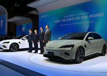 Chinese electric vehicle giant BYD has officially become the biggest electric vehicle brand in the United Kingdom, beating long-established rivals like Tesla, BMW and Volkswagen in one of Europe’s most competitive EV markets. According to the latest registration data from the Society of Motor Manufacturers and Traders (SMMT), BYD sold 12,754 electric vehicles in the UK through April 2026, securing more than 7% market share in the EV segment. The milestone marks a major shift in the British auto market, where European and American brands have traditionally dominated. A Rapid Rise In Just Three Years What makes BYD’s rise even more striking is the speed at which it happened. The company entered the UK market only a few years ago, yet it has already become the country’s best-selling EV brand among private buyers. BYD’s April sales alone jumped by 101.5% year-on-year, reaching 5,059 units compared to 2,511 units during the same period last year. Overall UK sales for the brand are up 124% year-to-date, touching 26,396 vehicles. That growth has pushed BYD ahead of several established automakers including Renault, Mini, Citroen and even Land Rover in total UK sales. Meanwhile, Tesla’s UK registrations remain relatively flat. The American EV maker recorded 12,570 units year-to-date, slightly down by 3.2% compared to 2025. Affordable EV Strategy Is Paying Off Industry analysts believe BYD’s success is being driven by aggressive pricing and a wide product lineup that appeals to everyday buyers. The company currently offers vehicles ranging from the affordable Dolphin Surf, priced at around £18,675, to premium SUVs like the Sealion 7, which starts at £47,025 and delivers up to 300 miles of WLTP-certified range. Unlike some competitors, BYD has managed to position itself as both affordable and feature-rich, giving buyers more value at a time when fuel prices and living costs remain high across the UK. Interestingly, BYD achieved this growth despite many of its models not qualifying for the UK government’s EV subsidy scheme, which offers discounts of up to £3,750 on eligible electric vehicles. UK EV Market Continues To Grow The broader UK electric vehicle market is also seeing strong momentum in 2026. EV registrations across the country grew by 22% year-on-year in April, reflecting rising consumer confidence and increasing adoption of electric mobility. BYD UK executive Bono Ge said the growing demand shows that British drivers are actively looking for more economical transportation options. “With fuel prices remaining high, more drivers are turning to electric vehicles as a smarter and more economical choice,” Ge stated while celebrating the company’s latest achievement. Chinese Brands Gain Ground In Europe BYD’s success is also part of a larger trend where Chinese automakers are rapidly expanding their footprint in Europe. Brands such as MG, Omoda, Jaecoo and Xpeng are all reporting strong growth in the UK market. For traditional European manufacturers, the message is becoming difficult to ignore. The EV race is no longer just about technology or brand legacy. Pricing, accessibility and speed to market are now defining the winners. And right now, BYD appears to be leading that race in Britain.