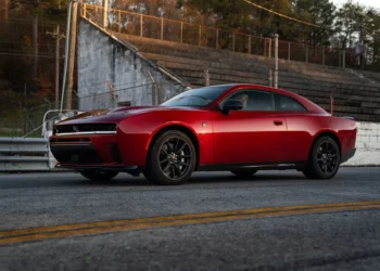 The Dodge Charger has always been more than just a car. For decades, it has represented American muscle in its loudest, boldest form. But today, the Charger finds itself at the center of one of the automotive industry's biggest transitions, balancing tradition with a future increasingly shaped by electrification. For 2027, Dodge isn't reinventing the Charger. Instead, it's refining what already exists. The latest updates bring more personalization options, a useful charging upgrade for EV owners, and a pricing strategy that is likely to get enthusiasts talking. And not necessarily in a good way. Daytona EV Gets a Serious Price Increase The biggest headline for the 2027 Charger isn't a new engine, more power, or a special edition model. It's the price tag. Dodge has significantly increased the cost of its all-electric Charger Daytona lineup. The two-door Daytona Scat Pack now costs $12,500 more than before, while the four-door version sees an $11,000 jump. That's a substantial increase in a market where many EV manufacturers are lowering prices or offering incentives to attract buyers. What's particularly interesting is that Dodge has left the prices of its gasoline-powered SIXPACK models untouched. For shoppers comparing both versions, that gap has suddenly become much wider. The Hurricane Six Still Carries the Torch Under the skin, very little changes for 2027. The Charger R/T SIXPACK continues with its twin-turbocharged 3.0-liter Hurricane inline-six producing 420 horsepower. Step up to the Scat Pack SIXPACK and output rises to 550 horsepower. While some traditionalists still miss the old Hemi V8, there's no denying the Hurricane engine delivers serious performance. Both versions come standard with all-wheel drive and feature a selectable rear-wheel-drive mode, allowing drivers to enjoy the kind of tail-happy character muscle car fans love. The Daytona EV also carries over unchanged mechanically. Its 670-horsepower setup remains one of the most powerful offerings in the segment, complete with Dodge's PowerShot boost function and the controversial Fratzonic exhaust system that attempts to bring some drama to the electric driving experience. More Personality Straight From The Factory One area where Dodge clearly listened to customers is personalization. For 2027, buyers can choose from more than 25 new factory options. New Petrol Blue leather seats, Demonic Red seat belts, fresh Mopar stripe packages, Satin Black hoods, and additional Brembo brake caliper colors give owners more ways to make their Charger stand out. It's a smart move. Modern buyers increasingly want vehicles that reflect their personality, and Dodge is leaning into that trend without changing the core formula. A Small Upgrade That Could Make a Big Difference While styling upgrades grab attention, one practical addition may end up being the most important. The Charger Daytona now comes equipped with a built-in NACS charging port, giving owners direct access to Tesla's extensive Supercharger network without needing an adapter. For EV buyers, convenience often matters as much as performance. Access to a larger charging network instantly makes road trips and daily ownership easier, and that could help make the Daytona a more compelling proposition. The Hemi-Sized Question Still Lingers Of course, no Charger conversation is complete without mentioning the missing Hemi. Despite persistent rumors and growing demand from enthusiasts, Dodge has once again chosen not to bring back a V8-powered Charger for 2027. Instead, the company remains committed to its strategy of offering both electric and Hurricane-powered six-cylinder options. Yet for many longtime fans, the Charger still feels incomplete without the unmistakable rumble of a Hemi under the hood. Rumors suggest a V8-powered comeback could happen later in the decade, potentially even opening the door for a future Hellcat. Until then, Dodge is asking enthusiasts to embrace a new era of muscle cars. Whether buyers are ready for that future remains one of the most fascinating questions facing the brand today.